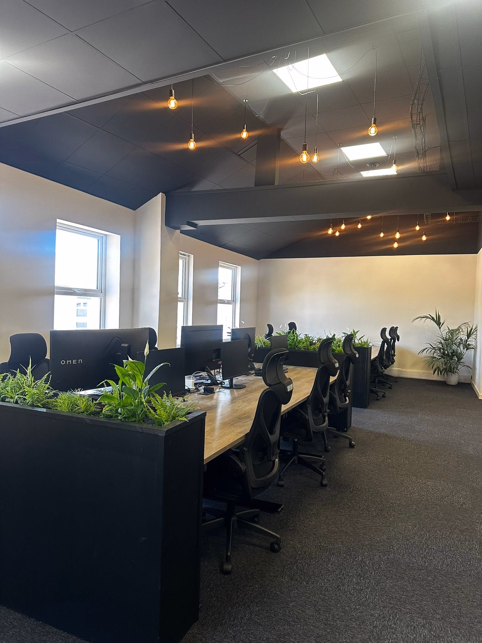 Open-plan coworking desks at Howfen House in Westhoughton